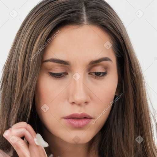 Neutral white young-adult female with long  brown hair and brown eyes