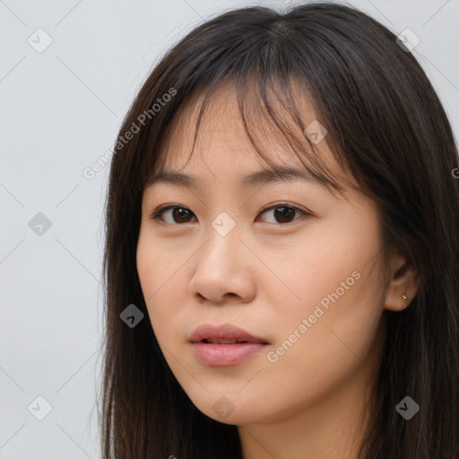 Neutral white young-adult female with long  brown hair and brown eyes