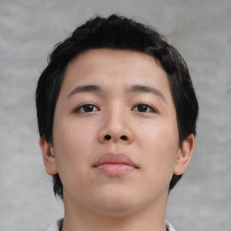 Neutral asian young-adult male with short  brown hair and brown eyes