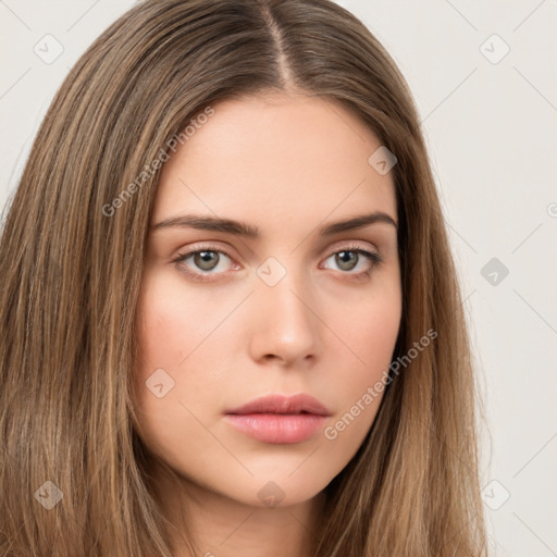 Neutral white young-adult female with long  brown hair and brown eyes