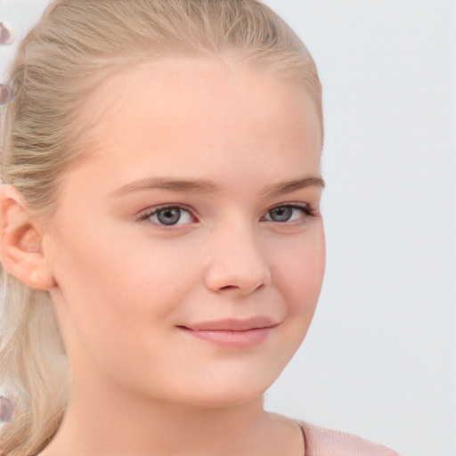 Joyful white child female with long  blond hair and blue eyes