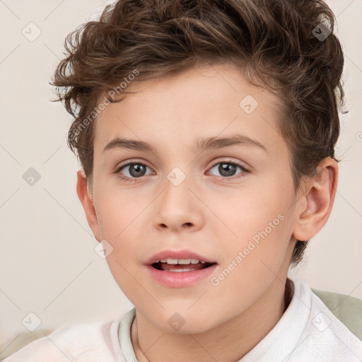 Joyful white child male with short  brown hair and brown eyes