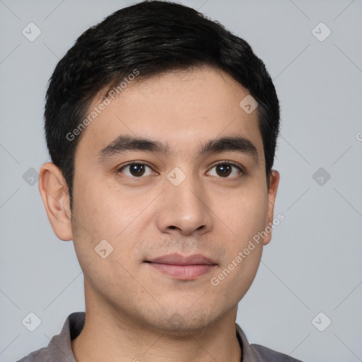 Joyful white young-adult male with short  black hair and brown eyes