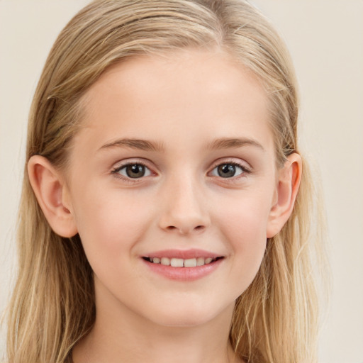 Joyful white child female with long  brown hair and brown eyes