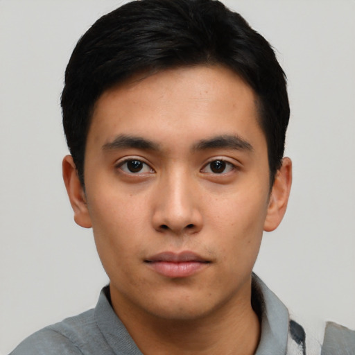 Neutral asian young-adult male with short  black hair and brown eyes