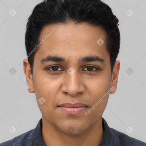 Joyful latino young-adult male with short  black hair and brown eyes