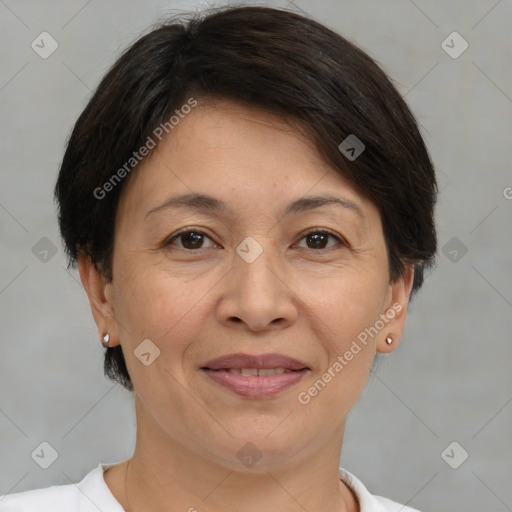 Joyful white adult female with short  brown hair and brown eyes