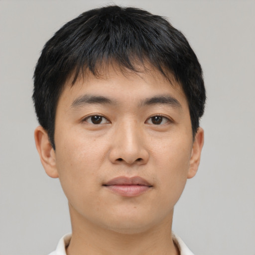 Neutral asian young-adult male with short  brown hair and brown eyes