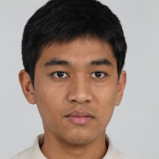 Neutral asian young-adult male with short  black hair and brown eyes