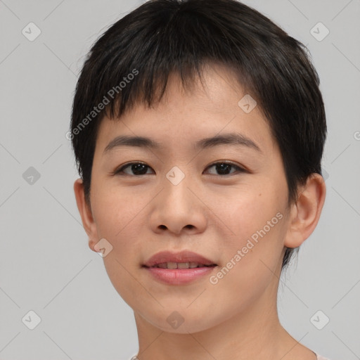 Joyful asian young-adult female with short  brown hair and brown eyes