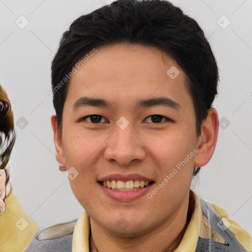 Joyful white young-adult male with short  brown hair and brown eyes