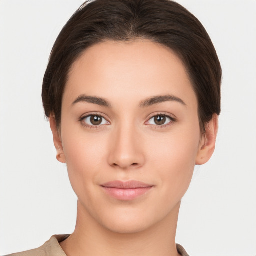 Neutral white young-adult female with short  brown hair and brown eyes