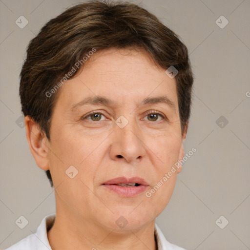 Joyful white adult female with short  brown hair and brown eyes