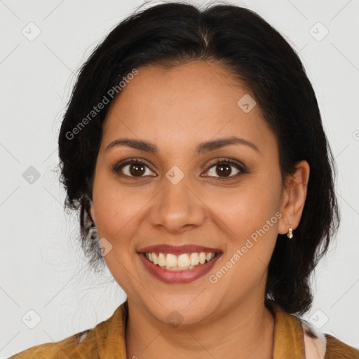 Joyful latino young-adult female with medium  brown hair and brown eyes