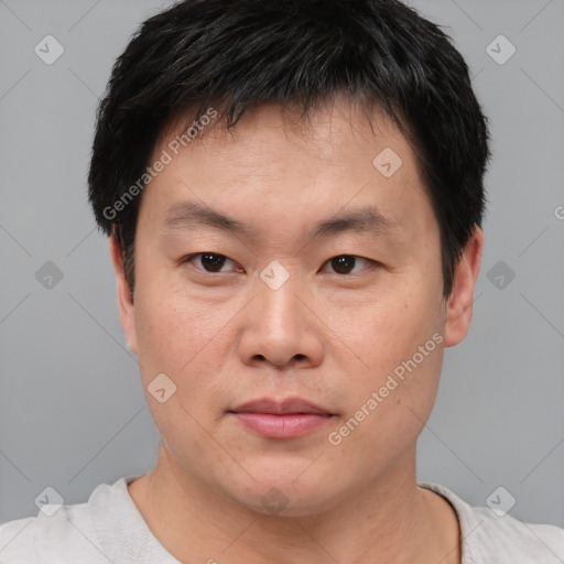 Neutral asian young-adult male with short  brown hair and brown eyes