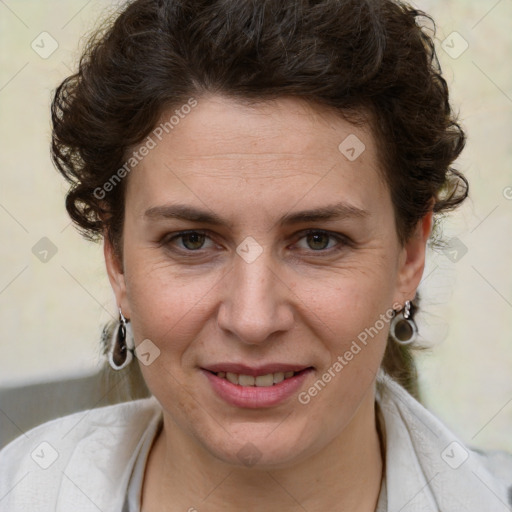 Joyful white young-adult female with medium  brown hair and green eyes