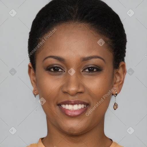 Joyful black young-adult female with short  brown hair and brown eyes