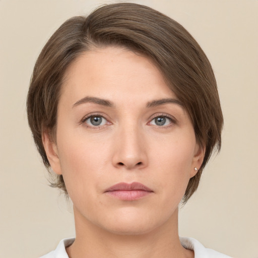 Neutral white young-adult female with medium  brown hair and brown eyes