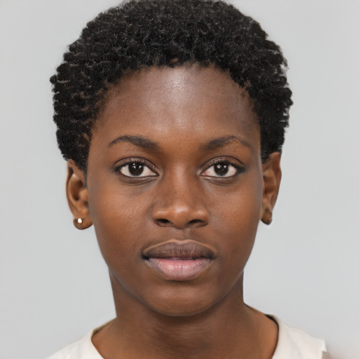 Neutral black young-adult female with short  black hair and brown eyes