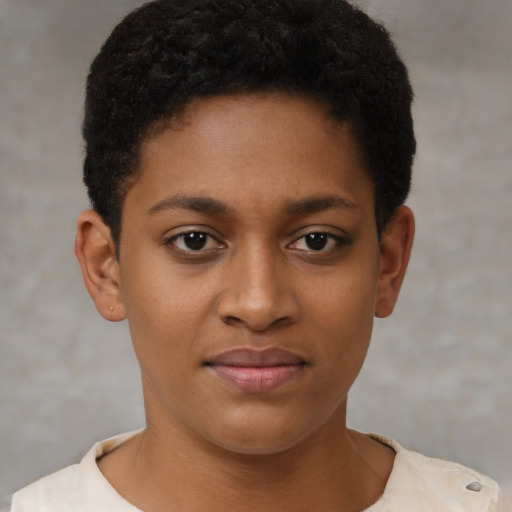 Joyful black young-adult female with short  brown hair and brown eyes