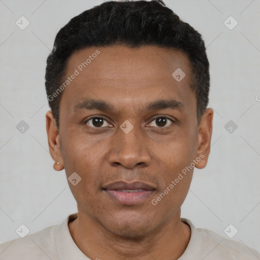 Joyful black young-adult male with short  black hair and brown eyes