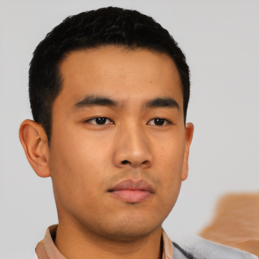 Neutral asian young-adult male with short  black hair and brown eyes