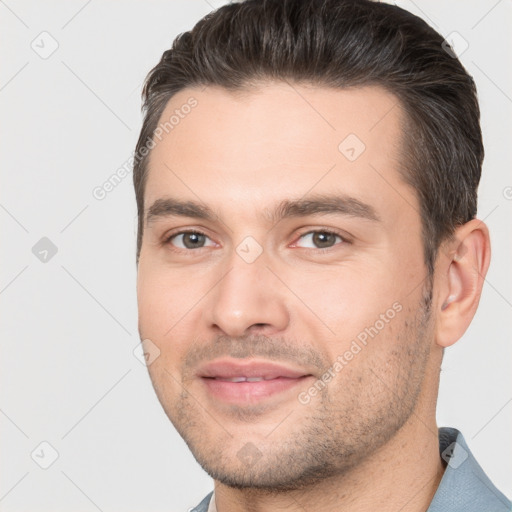 Joyful white young-adult male with short  brown hair and brown eyes