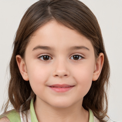 Joyful white child female with medium  brown hair and brown eyes