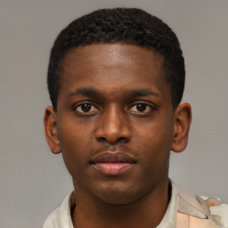 Neutral black young-adult male with short  brown hair and brown eyes