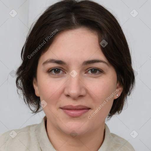 Joyful white young-adult female with medium  brown hair and grey eyes