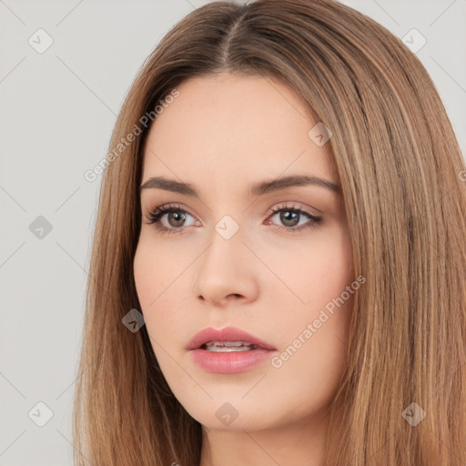 Neutral white young-adult female with long  brown hair and brown eyes