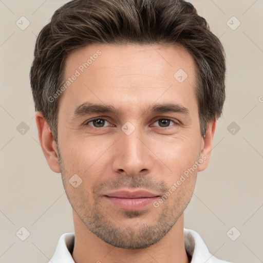 Joyful white young-adult male with short  brown hair and brown eyes