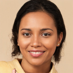 Joyful latino young-adult female with long  brown hair and brown eyes