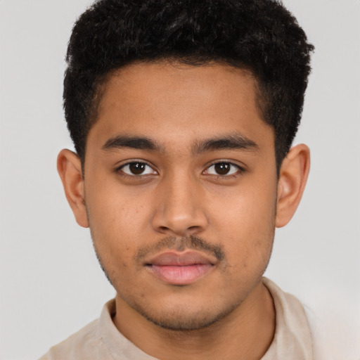 Neutral latino young-adult male with short  brown hair and brown eyes