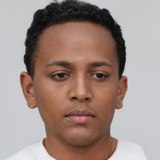 Neutral black young-adult male with short  brown hair and brown eyes