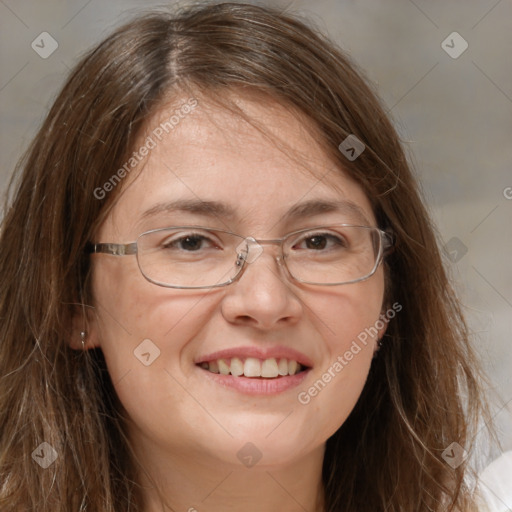 Joyful white adult female with long  brown hair and brown eyes