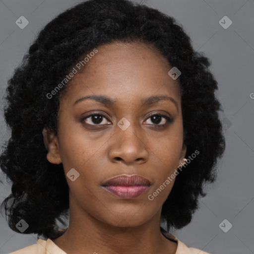 Neutral black young-adult female with medium  brown hair and brown eyes