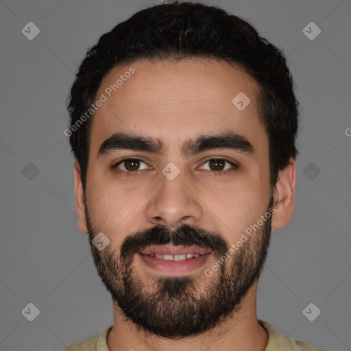 Joyful latino young-adult male with short  black hair and brown eyes