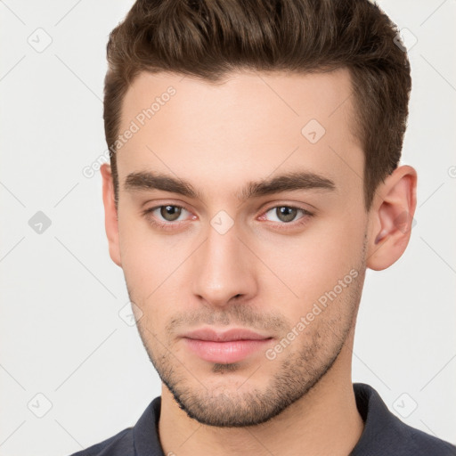 Neutral white young-adult male with short  brown hair and brown eyes