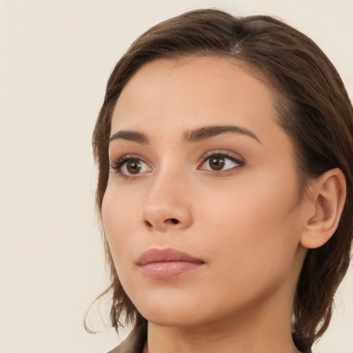 Neutral white young-adult female with medium  brown hair and brown eyes