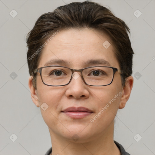 Joyful white adult female with short  brown hair and brown eyes