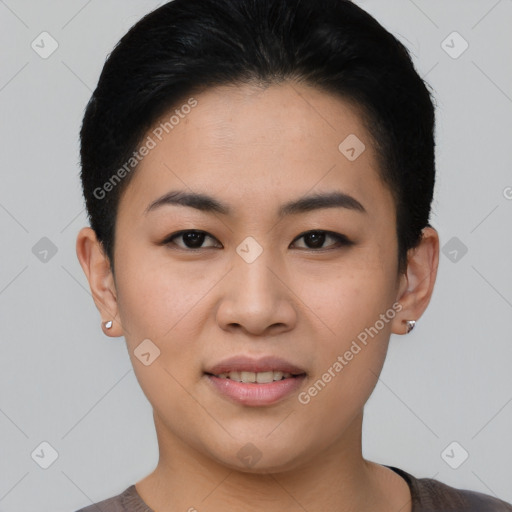 Joyful asian young-adult female with short  black hair and brown eyes