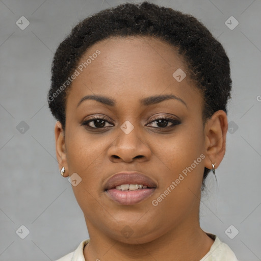 Joyful black young-adult female with short  brown hair and brown eyes