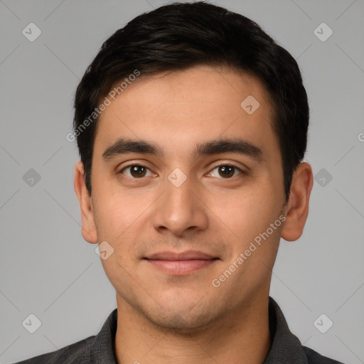 Joyful white young-adult male with short  black hair and brown eyes