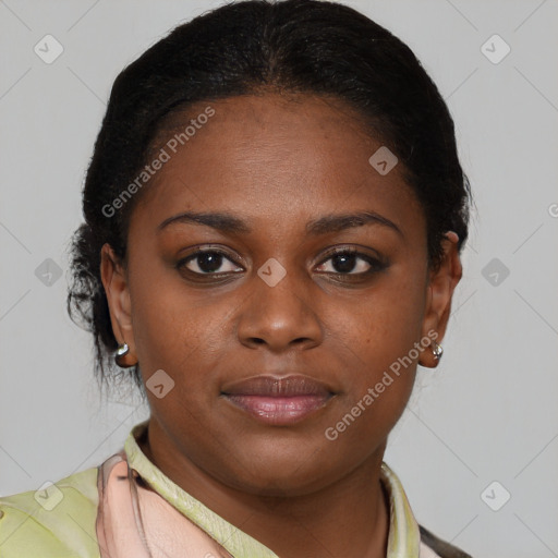 Joyful black young-adult female with medium  brown hair and brown eyes