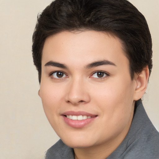 Joyful white young-adult female with short  brown hair and brown eyes