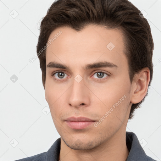 Neutral white young-adult male with short  brown hair and brown eyes