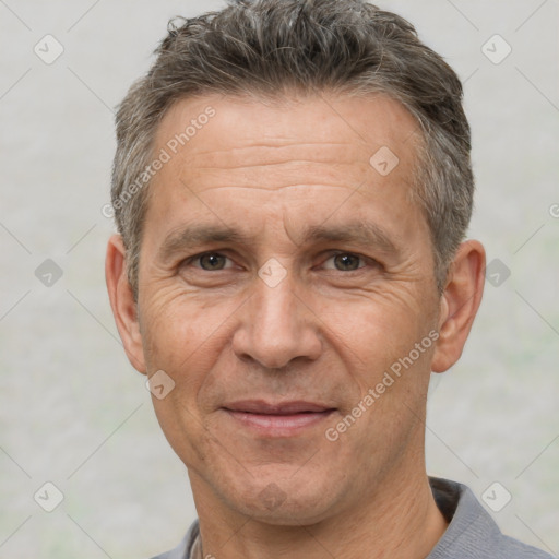 Joyful white middle-aged male with short  brown hair and brown eyes