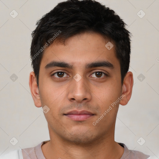 Neutral white young-adult male with short  black hair and brown eyes