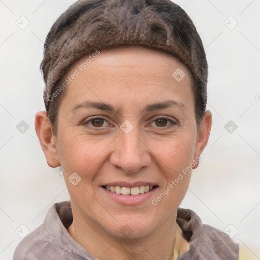 Joyful white adult female with short  brown hair and brown eyes